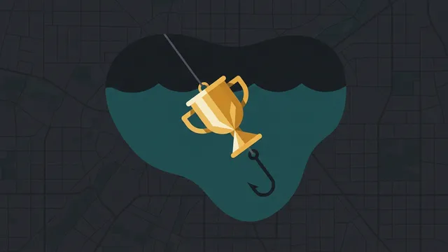 A shiny gold fishing lure shaped like a small trophy dangling on a line in dark teal water, a hook visible beneath it